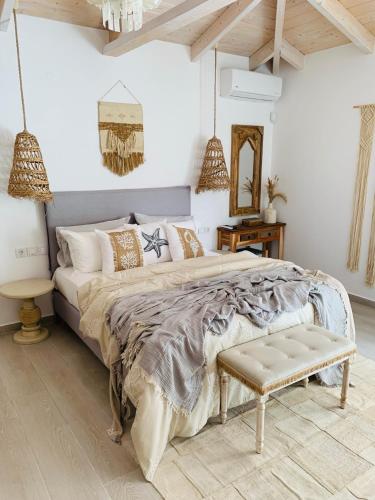 Postel nebo postele na pokoji v ubytování Linari Bohemian Living