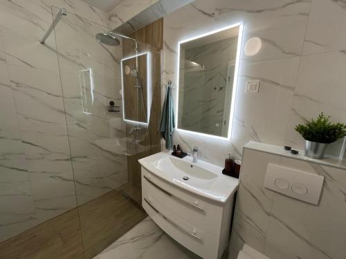 Koupelna v ubytování Apartmán Povljana