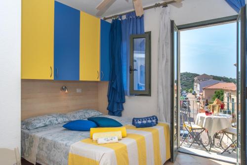 Postel nebo postele na pokoji v ubytování Villa Rosa - Casa delle Bambole