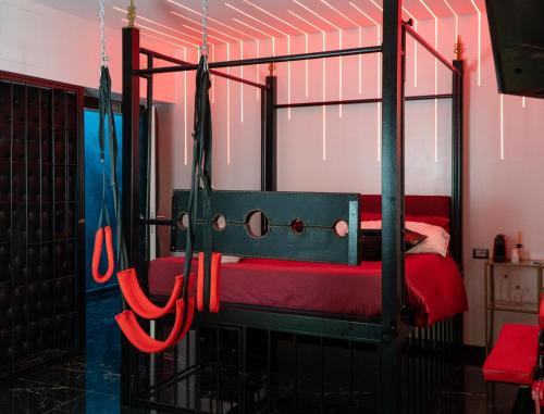 Ένα ή περισσότερα κρεβάτια σε δωμάτιο στο Suite Luxury BDSM