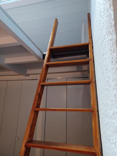 a ladder in a room with a ceiling at Aurette in Saint-Lary-Soulan