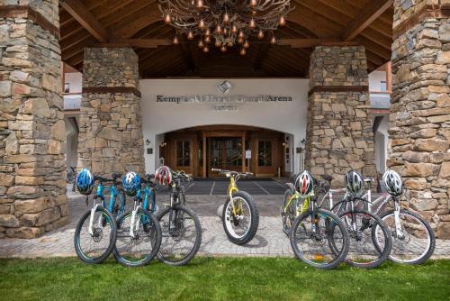 a group of bikes parked in front of a building at Kempinski Hotel Grand Arena Bansko in Bansko