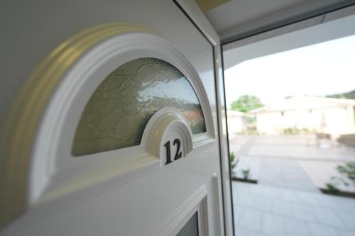 a door with the number on it at Makaza Complex in Momchilgrad