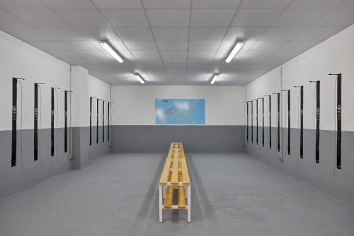 a room with a yellow ladder in the middle of it at Ilusion Markus & Spa in Can Picafort