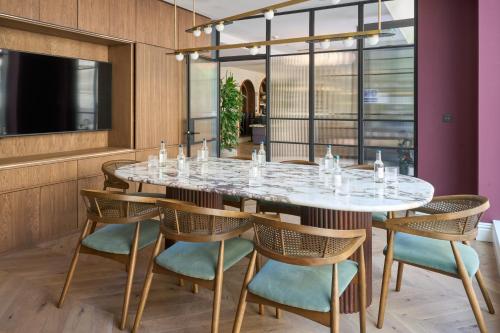 a dining room with a table and chairs at The Store in Oxford