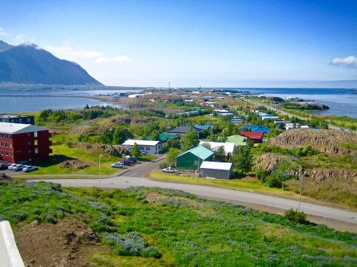 a small town on the shore of a body of water at Hrossholt in Stykkishólmur