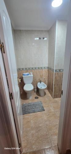 a bathroom with a toilet and a bidet at Terraza al mar in Salobreña