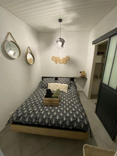 Ένα ή περισσότερα κρεβάτια σε δωμάτιο στο Appartement Jonzac