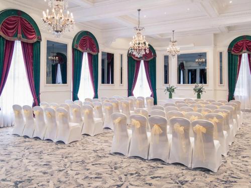 a room with a bunch of chairs in a room at The Grand Bristol By Sunday in Bristol