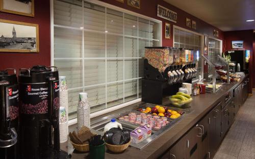 a kitchen with a counter with food on it at Coast Hilltop Inn in Pullman