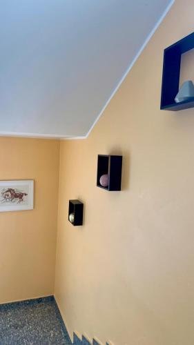 TV a/nebo společenská místnost v ubytování Airuno Rooms