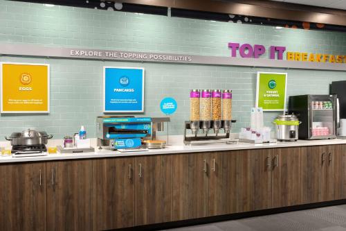 a counter in a store with a top flighturanceacistacist at Tru by Hilton Jacksonville West I 295 in Jacksonville