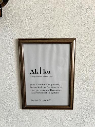 a picture hanging on a wall in a frame at Gemse-Schneiders Wohnen auf dem Bauernhof in Schollbrunn