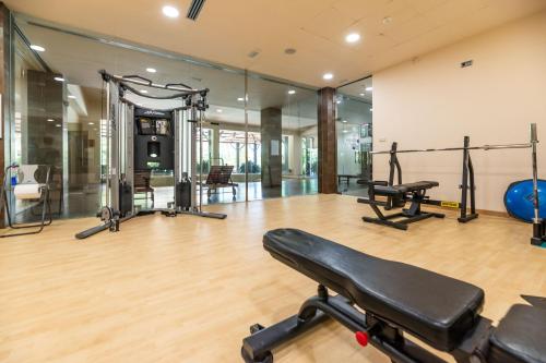 an empty gym with exercise equipment in a building at Spacious 2-bed apt Capanes del Golf in Benahavís