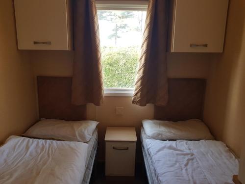 Postel nebo postele na pokoji v ubytování Pine Ridge