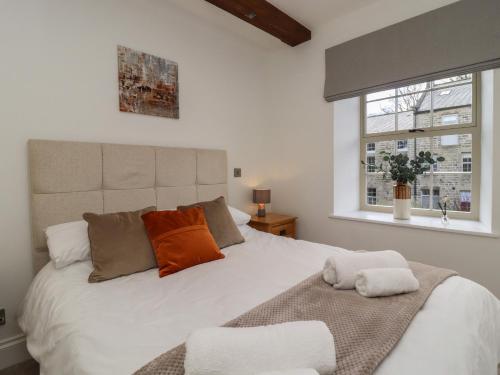 Postel nebo postele na pokoji v ubytování Millnook