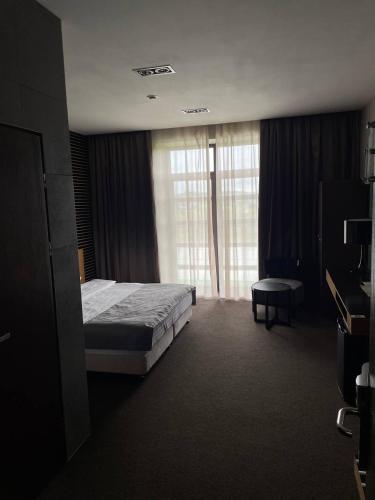 Ένα ή περισσότερα κρεβάτια σε δωμάτιο στο Park Hotel Switzerland