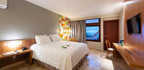 Hotel Pontal de Ubuにあるテレビまたはエンターテインメントセンター