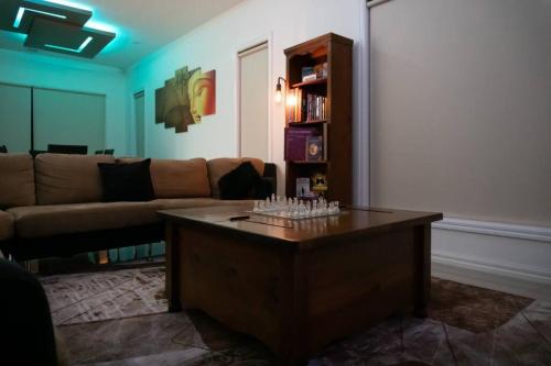 a living room with a couch and a coffee table at Hodgson in Tarneit