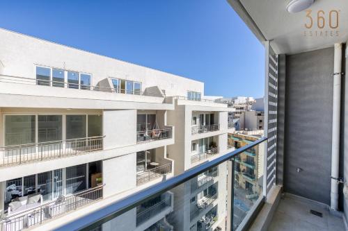 a view from the balcony of a building at The St Pauls Bay Escape Suites by 360 Estates in St Paul's Bay