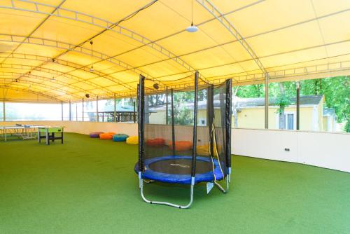 a large tent with a playground in the middle at Sovinyon Resort in Odesa