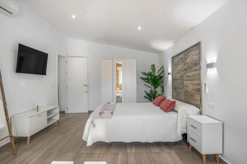 Ένα ή περισσότερα κρεβάτια σε δωμάτιο στο Casa El Buda