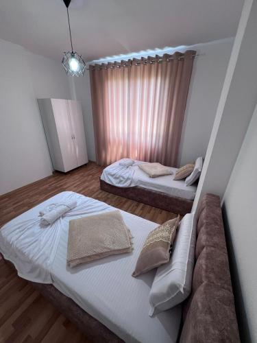 Postel nebo postele na pokoji v ubytování KEDA's-Guesthouse