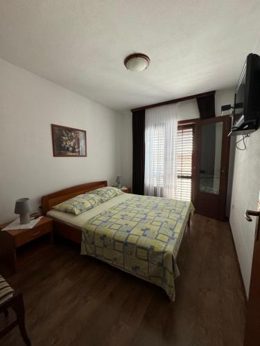 Posteľ alebo postele v izbe v ubytovaní Apartment Tea Katnic