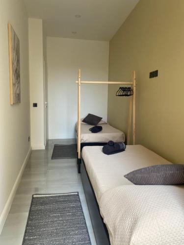Alpha Apartmentにあるベッド