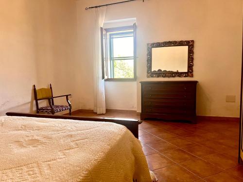 Postel nebo postele na pokoji v ubytování Lo Stazzu - Key to Villas