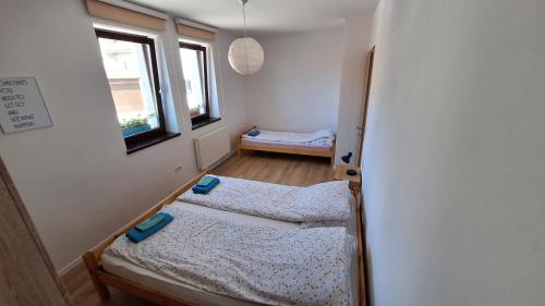 Postel nebo postele na pokoji v ubytování Residence Lubina