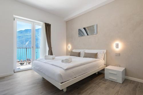 Ένα ή περισσότερα κρεβάτια σε δωμάτιο στο Jacky's Apartments