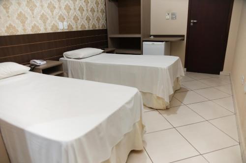 Katil atau katil-katil dalam bilik di Hotel Villa Canoas