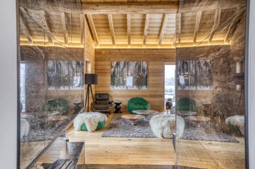 Photo de la galerie de l'établissement Grand chalet récent avec Jacuzzi, ski au pied, à Praz-sur-Arly