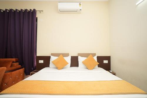 HOTEL A.P RESIDENCYにあるベッド