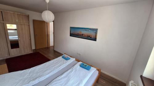 Postel nebo postele na pokoji v ubytování Residence Lubina