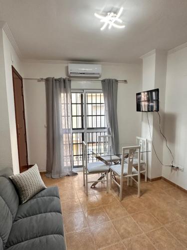 Телевизор и/или развлекательный центр в Apartamento La Mar