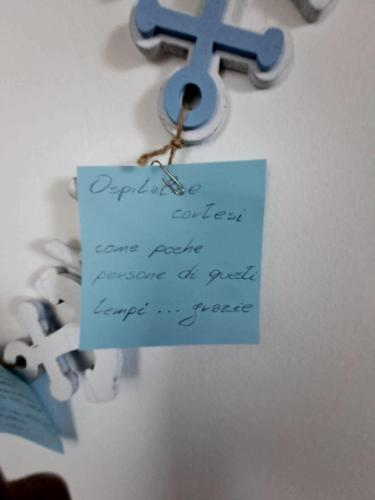 a piece of paper with a key on a wall at CityView in Latina