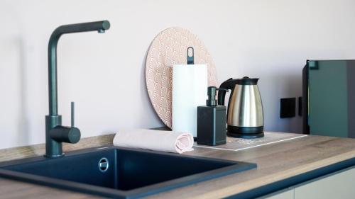 Køkken eller tekøkken på CALA Appartamenti