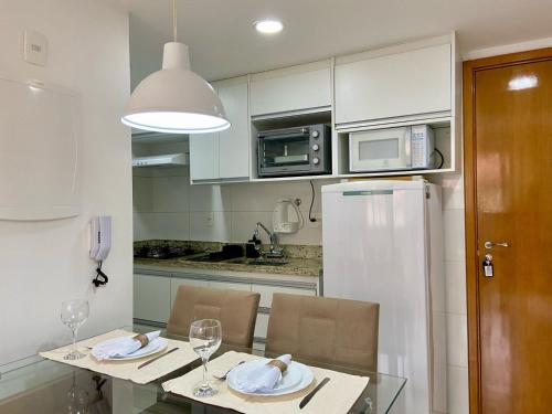 Dapur atau dapur kecil di Refúgio da Serra - Conforto e tranquilidade com piscina e academia