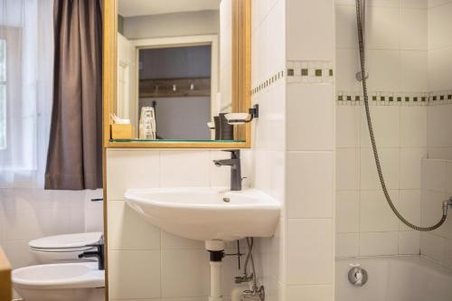 Un baño de Residence Grünbacher
