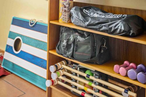 a wooden shelf with a bag and other items at CherryView Lane in White Salmon