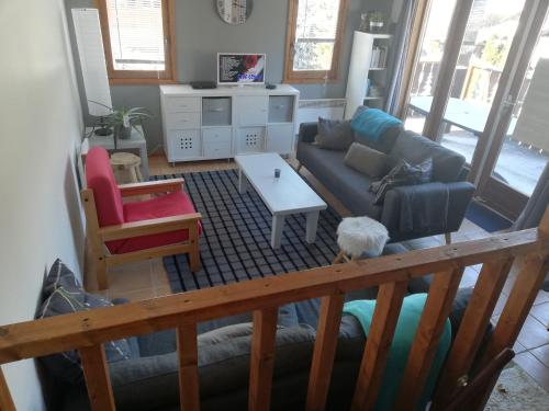 Posezení v ubytování Beautiful apartment duplex in a chalet with garden for 6 in Morillon