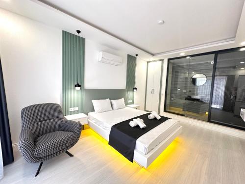Katil atau katil-katil dalam bilik di Bossa Nova Apart Hotel