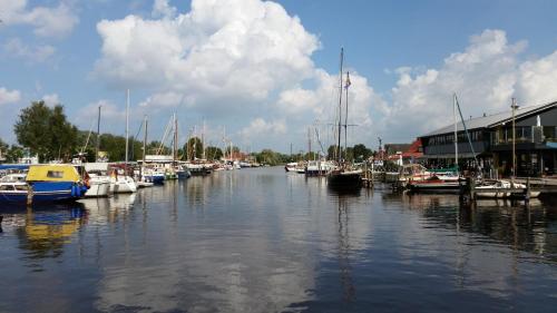 a group of boats are docked in a marina at Komfortable Apartments in der Villa Eule in Varel