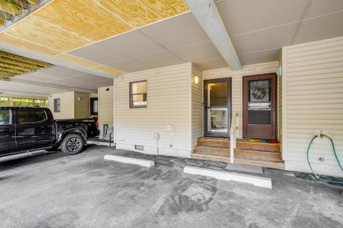 a house with a truck parked in front of it at Walk to Shore and Boardwalk Bethany Beach Retreat in Bethany Beach