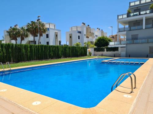 Πισίνα στο ή κοντά στο AMPLIO APARTAMENTO DÚPLEX con PISCINA