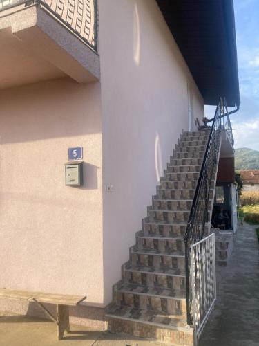 a set of stairs next to a building at Apartman Zlatija in Bajina Bašta