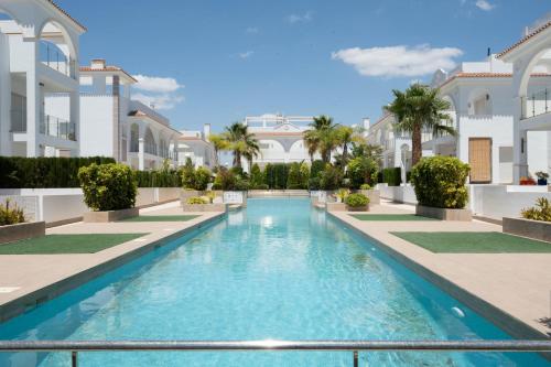 an image of a swimming pool in a villa at Helgafell Superior Courtyard Suite in Ciudad Quesada
