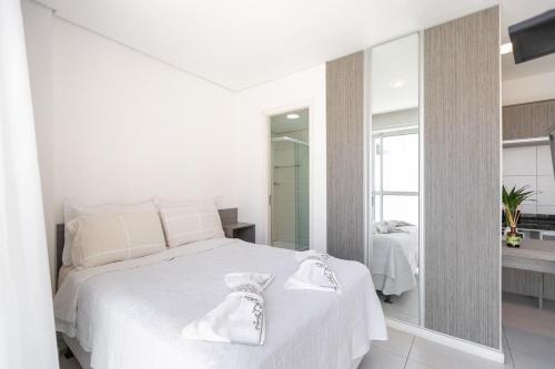 Cama ou camas em um quarto em Studio Espaço Moderno